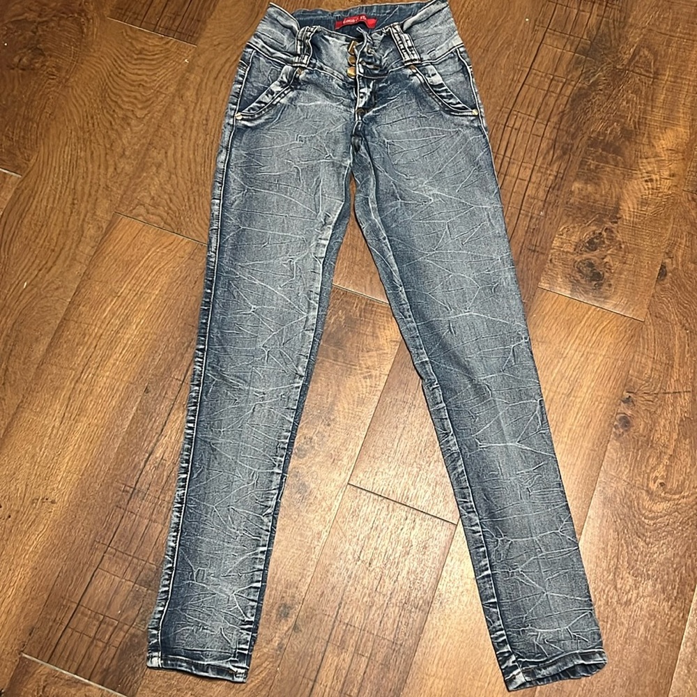 Medium wash, crinkle creased, high waisted, skinny jeans